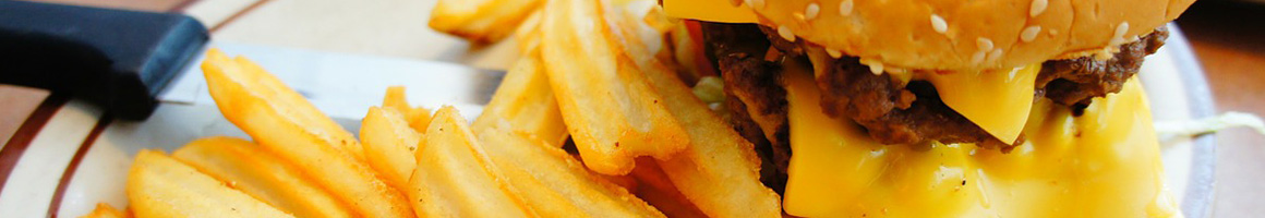 Eating Burger at Cheeseburger Bobby's restaurant in Peachtree Corners, GA.